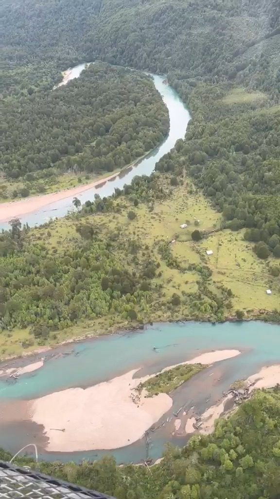 Helicopter flight over the Río Blanco valley towards River of Dreams Base Camp