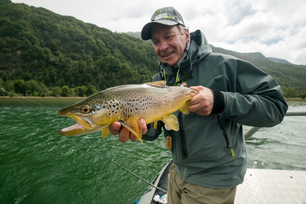 Angler with a brown trout during the Orvis visit